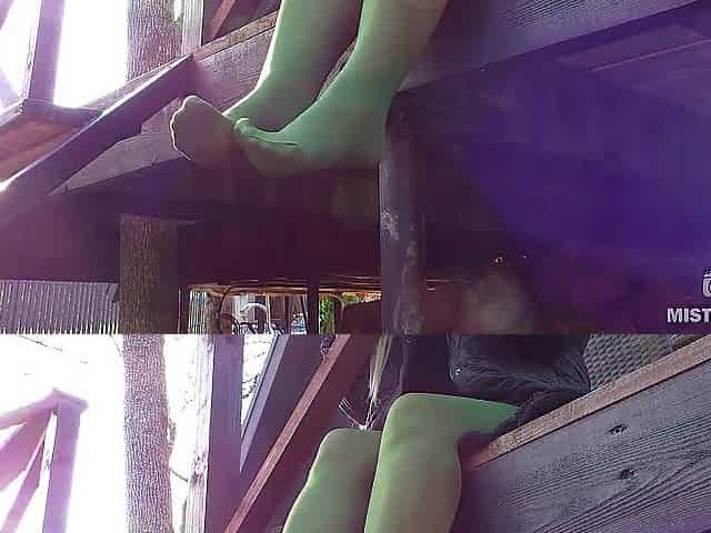 My nylon feet in green tights on your face
