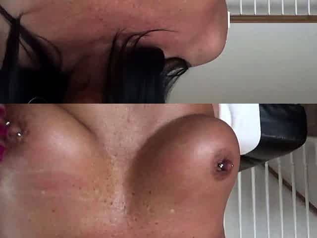 Busty babe playing with her big boobs