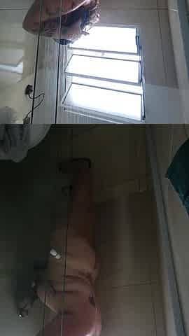 big beautiful woman takes a shower after gym