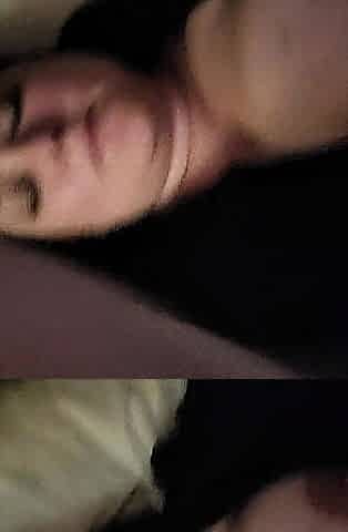 Chick in ebony costume plays with sex tool