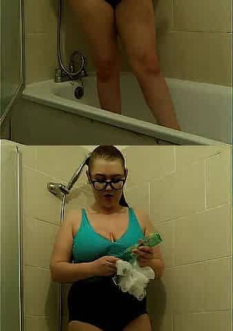 big beautiful woman Penny showering in ebony swimsuit