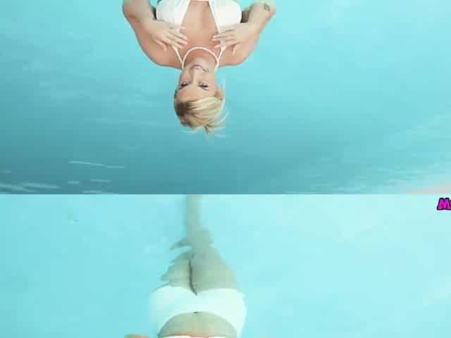 Voluptuous Irich Essie Flashed Her Large Melons During the time that In The Pool