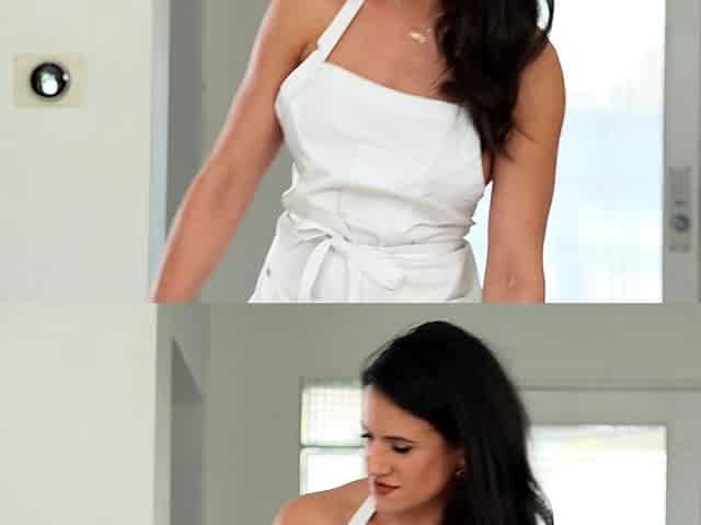 A super sexy brunette massages her big boobs
