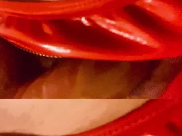 Red latex pants and a sex tool
