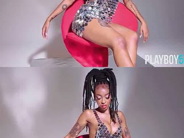 Kinky ebony teen model exposes her large ass and pierced nipps