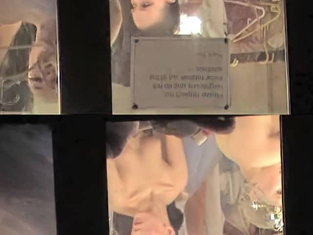 Almost naked dancers filmed through the window