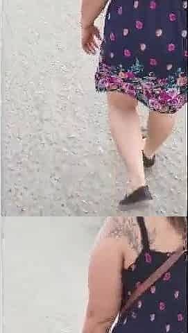 FOLLOWING MADURA ON THE STREET WITH A PETTICOAT AND THREAD