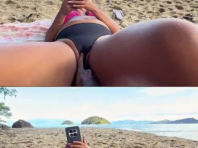 Squirting on the beach with the fisherman watching and thoroughly enjoying it.