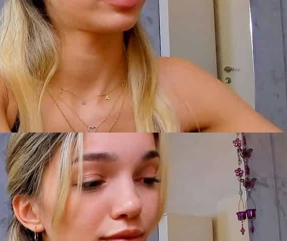 Blonde teen in solo action with her pussy