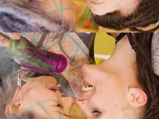 Anuskatzz in wild lesbian fisting action with her bald, tattooed, pierced partner