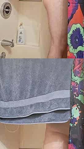 Enjoying a sexy shower with a plug in