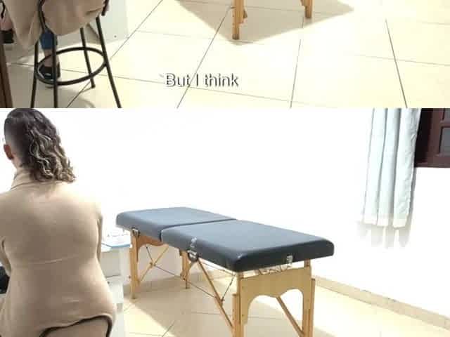 Proctologist performs anal exam on constipated patient.