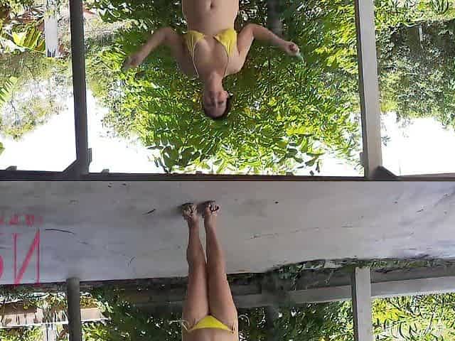 Stripped woman jumping rope Her bazookas are shaking Outdoor