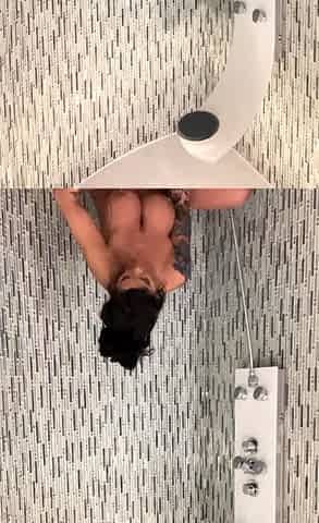 Hot babe with perfect big boobs taking shower