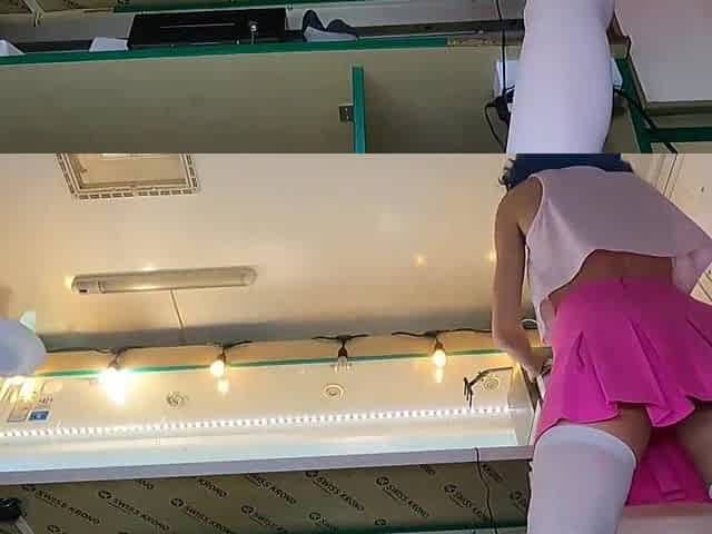 Sexy brunette hair hottie singing and dancing with stripped butt at work