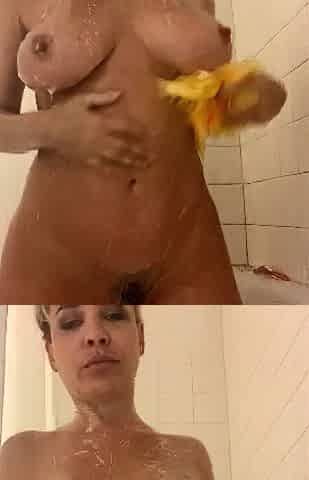 Hot Blonde Babe in Black Nylons Masturbates Solo