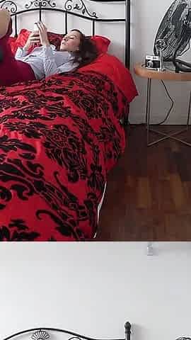 Miss Smith Relaxes After Work in Her White Blouse and Red Skirt