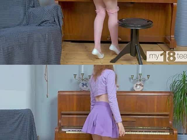 Redhead chick fingering her twat in the music class