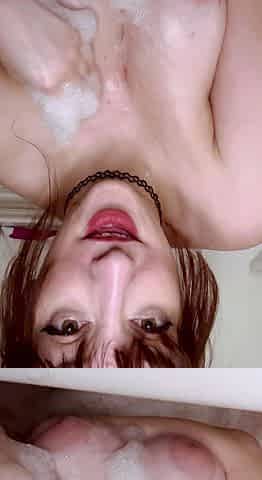 Amateur redhead fully nude on bed and masturbating