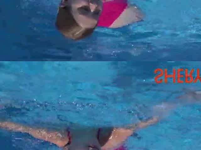 2 cuties are having pleasure in the pool.