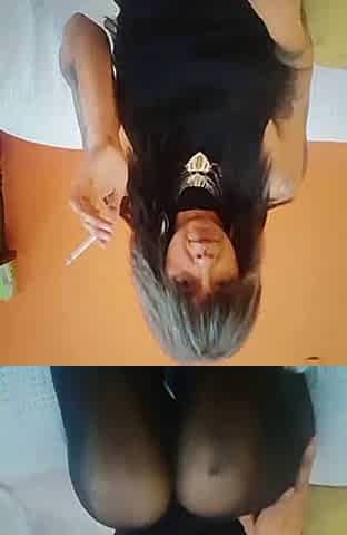 Horny mature slut smoking and stroke her cunt