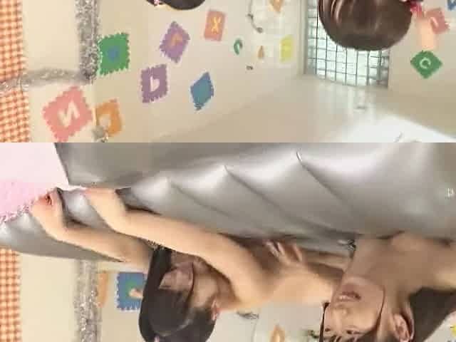 She plays with the man's penis, puts it on one after another, and ejaculates on his stomach.