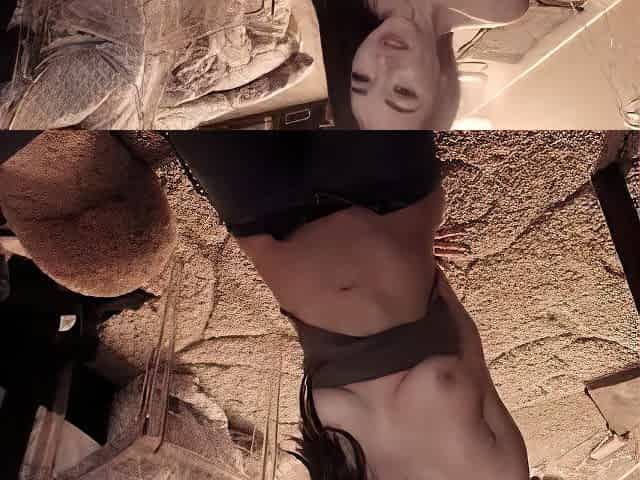 Busty babe playing with her big boobs
