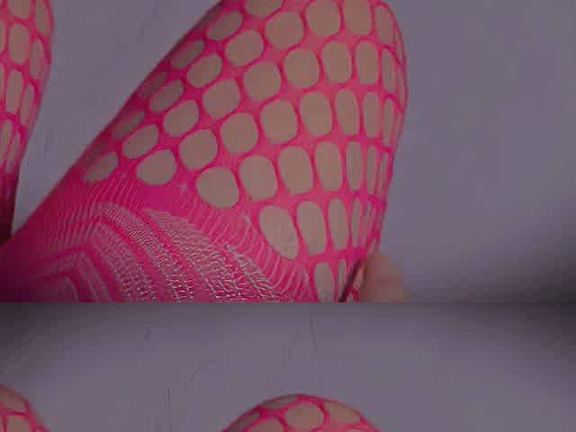 Pink fishnet sissy bitch getting lustful on white daybed sheets