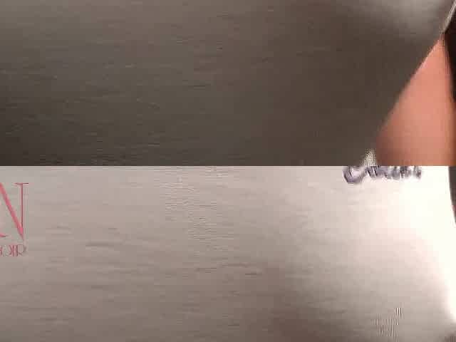 Breathtaking lady Regina Noir shows her cunt lying on the bed.