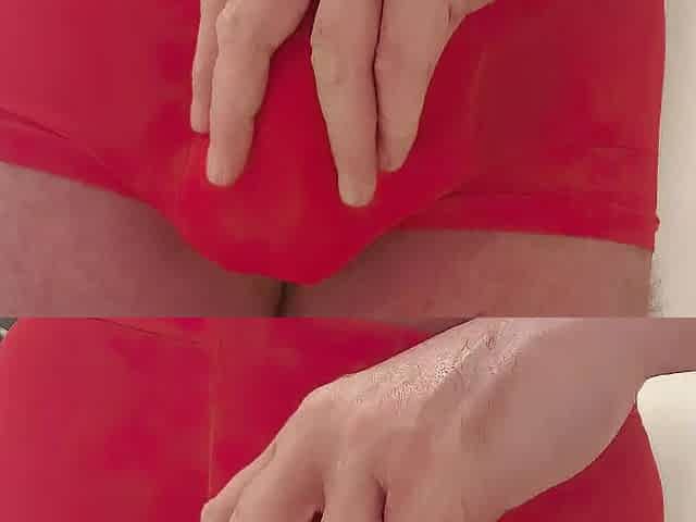 Red constricted underclothes pissing in the shower