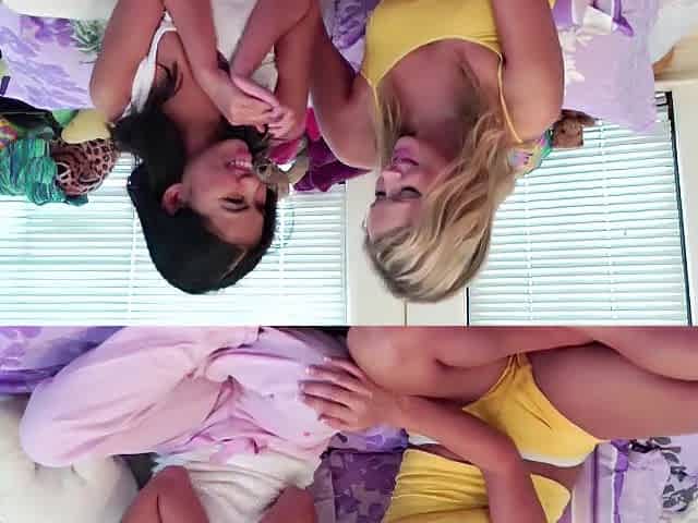A white blond and an Oriental brunette hair play a kinky lesbo fingering game in couch