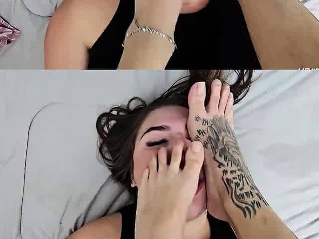 Tattooed busty brunette with foot fetish does hot footjob