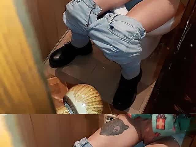 I caught a stranger masturbating on the lavatory in a public restroom and we came at the same time