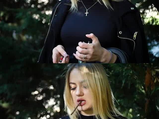 Hot Blonde Babe Smoking Two Black Cigarettes in Nature