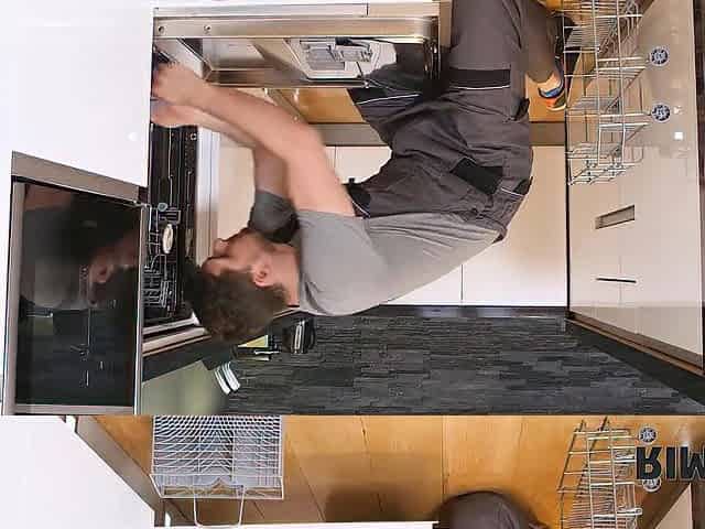RIM4K. Girl interrupts repairer and begins licking his booty by the dishwasher