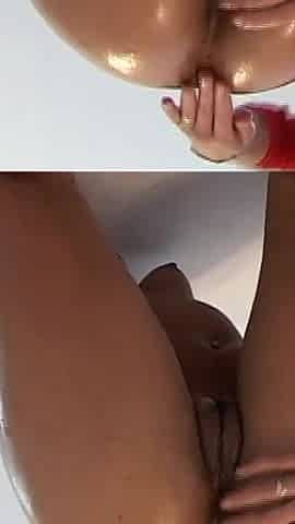 Oiled Pussy Fingered by Lesbian
