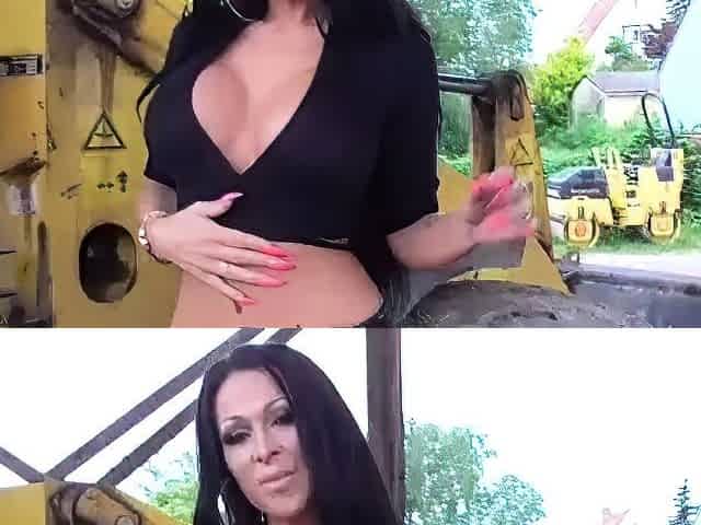Busty babe playing with her big boobs
