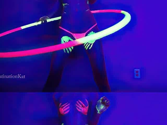 Dances And Hula Hoops Under A Black Light