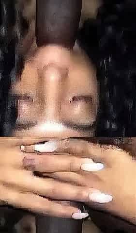 Plump ebony tugging a big white cock close up and loving it