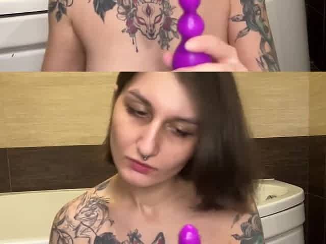 Bitch fucks her ass with an Anal Toy
