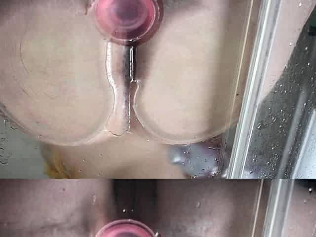 Horny hot blonde masturbates in the shower with a toy