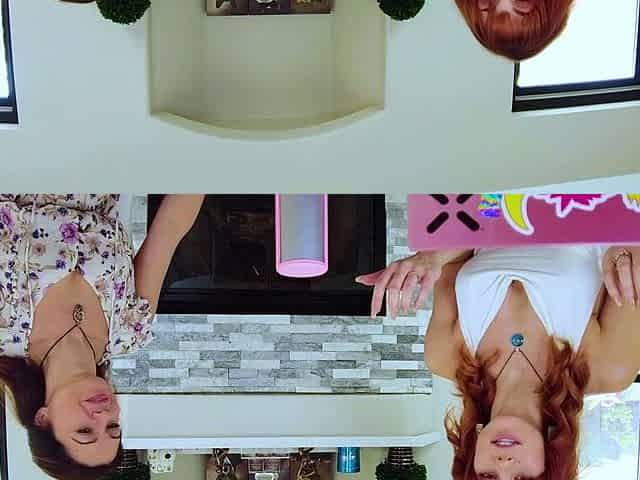 A redhead fucks a brunette in sexy lesbian porn