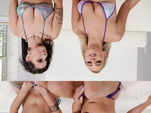 Busty babe playing with her big boobs