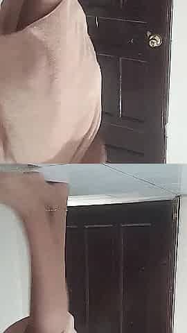 My girlfriend films herself after showering, showing off her large butt.