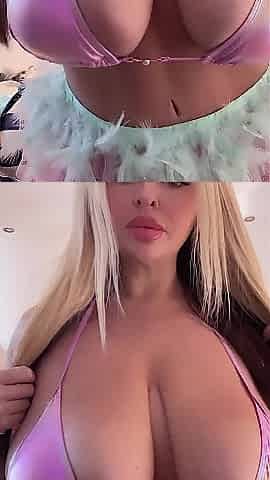 Large natural melons cowardly saggy in a ballerina dancer dress