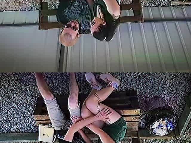 A pair in love is having coarse banging in public in the park