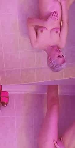 Cute blonde masturbate in the bath