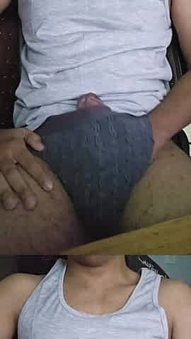 Thick dong cums underneath the grey shirt