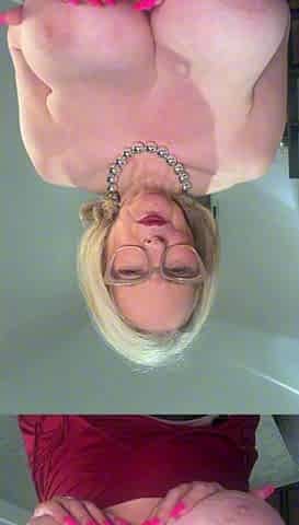 Busty MILF fucks big black dildo