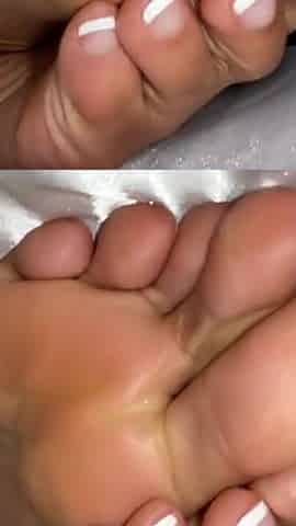 Ebony Girl Under Her Covers in Bed Show off Feet